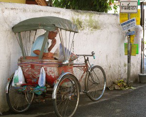 Man on a tuk tuk, Thailand cuisine